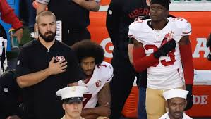 Athletes "Taking Stand" by Kneeling