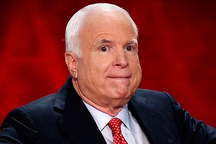 U.S. Senator John McCain (R-AZ) gestures as he arrives to address the third session of the Republican National Convention in Tampa, Florida, August 29, 2012. REUTERS/Mike Segar (UNITED STATES  - Tags: POLITICS ELECTIONS)   - RTR3797G