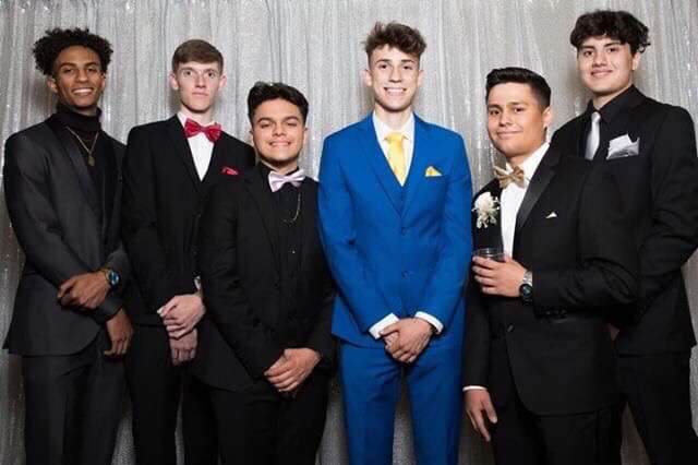 Racham at the 2019 Senior Prom (third in from the left)