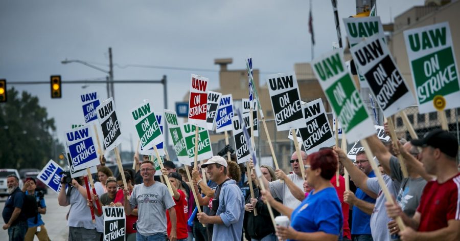 UAW Workers picketing outside General Motor's factories and facilities (from TIME.com)