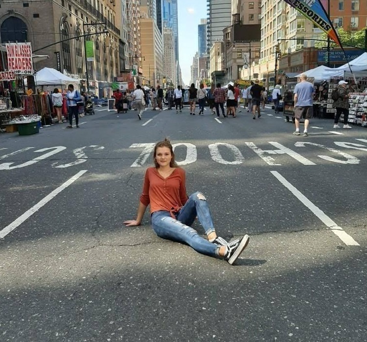 Daria Bauer posing in the street on her first ever trip to New York City!