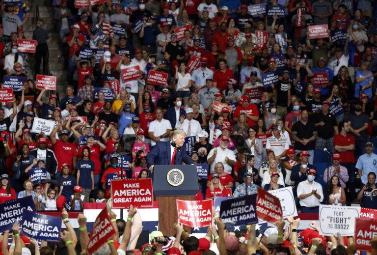 FILE - In this Saturday, June 20, 2020, file photo, President Donald Trump speaks at BOK Center during his rally in Tulsa, Okla. The head of the Tulsa-County Health Department says Trump’s campaign rally in late June “likely contributed” to a dramatic surge in new coronavirus cases there. (Stephen Pingry/Tulsa World via AP, File)