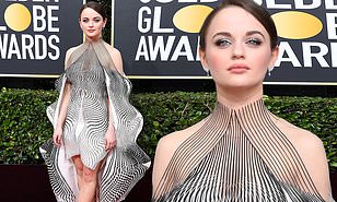 Joey King is a young female actress. She wore this statement piece to the Golden Globe Awards but it is  not a fan favorite. The dress is very busy and has a lot going on with the shape of the dress. Although the dress is unique, it is not unique in a good way. Joey King has some beautiful red carpet looks but this dress was not one of them.