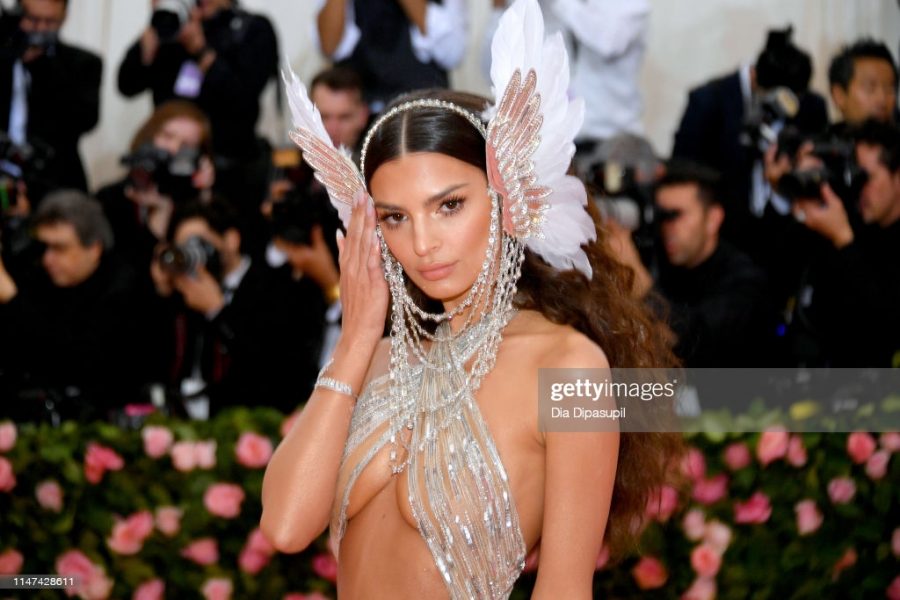 Elegantly encapsulating the 2019 theme "Camp: Notes on Fashion, an ode to all things over the top," supermodel Emily Ratajowski remains my all-time favorite look in this stunning naked gown. Her toned abs accentuated in the barely-there sparkly Dundas silhouette while draped in an angel wing headpiece, this is EXACTLY how you do the Met. I can't get enough of this look. 100000000/10. (Photo by Dia Dipasupil/FilmMagic)