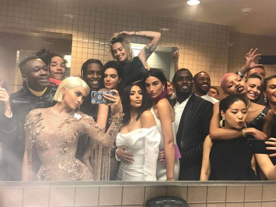 Swarm of A-Listers pose for mirror selfie in the Met Gala bathroom.