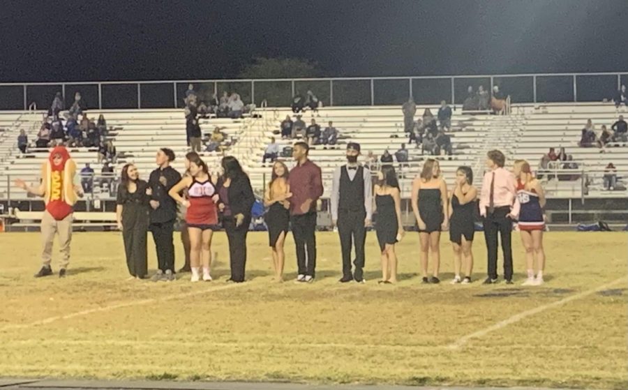 The nominees of this years homecoming awaiting results on the football field. 