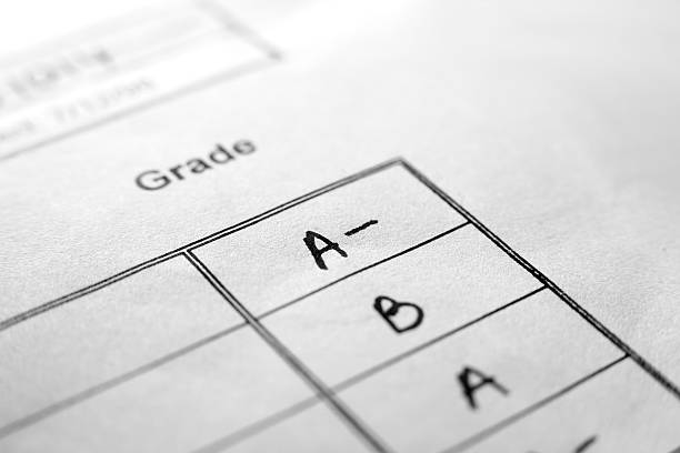 Macro shot of A- on white results sheet. Extremely shallow focus.