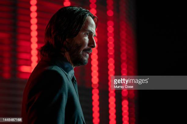 Canadian-born actor Keanu Reeves (in costume as 'John Wick') in a scene from the film 'John Wick: Chapter 4' (directed by Chad Stahelski), Berlin, Germany, July 2021. The scene, with Berlin standing in for Osaka, Japan, is from the fourth film in the series, set for release in 2023. (Photo by Murray Close/Moviepix/Getty Images)