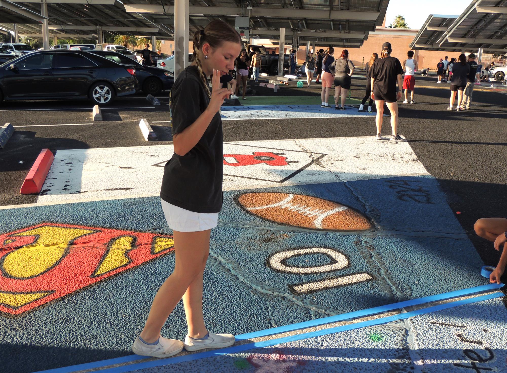 Class of 2025's First Event: Painting Senior Parking Spots