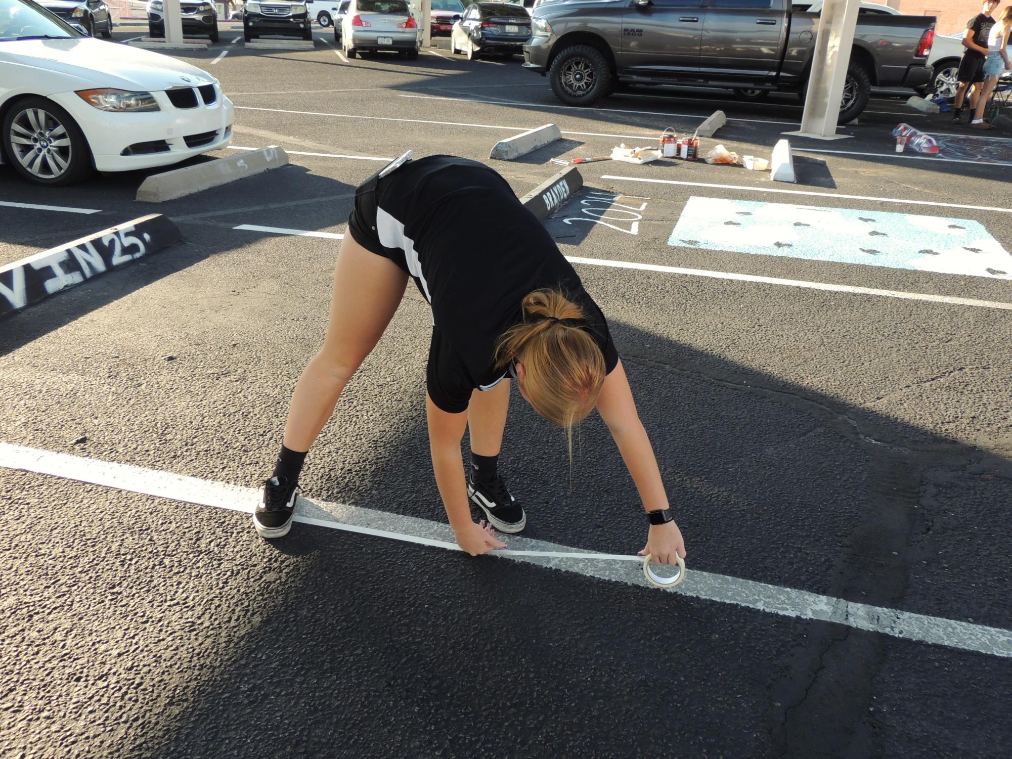 Class of 2025's First Event: Painting Senior Parking Spots