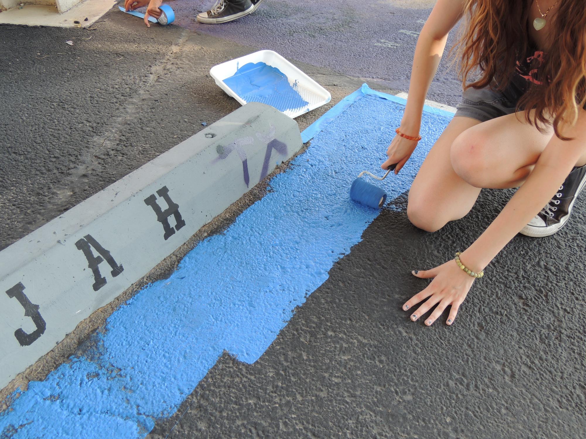 Class of 2025's First Event: Painting Senior Parking Spots