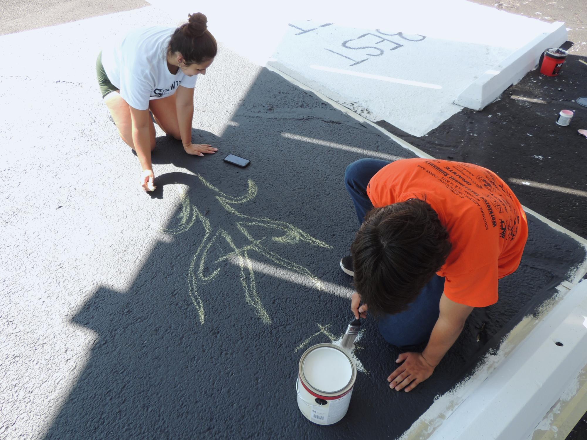 Class of 2025's First Event: Painting Senior Parking Spots