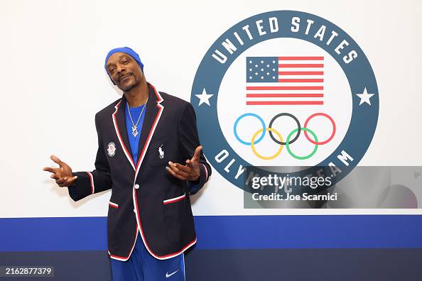 PARIS, FRANCE - JULY 21: Snoop Dogg tries on clothes during Team USA Welcome Experience ahead of Paris 2024 Summer Olympics at Polo Ralph Lauren on July 21, 2024 in Paris, France.   (Photo by Joe Scarnici/Getty Images for USOPC)