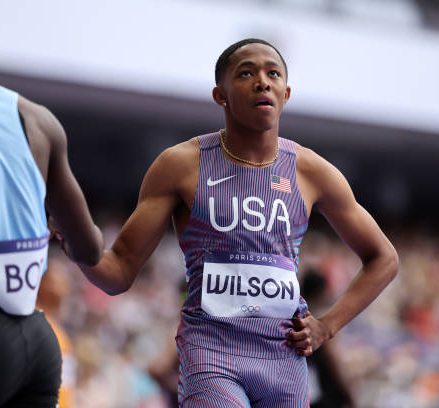 PARIS, FRANCE - AUGUST 09: Quincy Wilson of Team United States looks on after competing in the Men's 4 x 400m Relay Round 1 on day fourteen of the Olympic Games Paris 2024 at Stade de France on August 09, 2024 in Paris, France. (Photo by Hannah Peters/Getty Images)