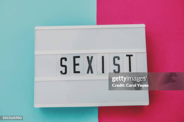 sexist word in pink and blue background