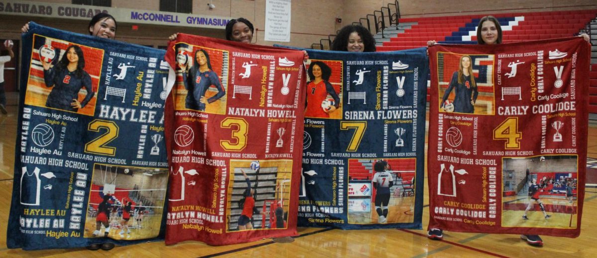 Seniors show off their custom-made blankets