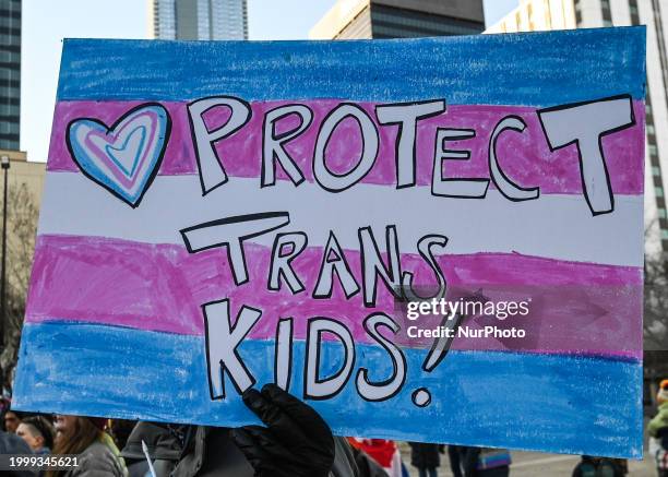 EDMONTON, CANADA - FEBRUARY 11:
Protestors during a rally at Churchill Square in support of trans youth in Alberta following the 'Sing With Love' concert at McDougall United Church, on February 11, 2024, in Edmonton, Alberta, Canada.
The concert and rally, held in downtown Edmonton on Sunday afternoon, aimed to demonstrate solidarity with the trans community in response to recent government policies impacting trans children. (Photo by Artur Widak/NurPhoto via Getty Images)