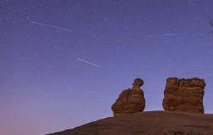 KONYA, TURKIYE - AUGUST 12: A view of the sky shows the Perseid meteor shower captured with long-exposure photography at the Kusca fairy chimneys in Cihanbeyli district of Konya, Turkiye during the night hours on August 12, 2025. (Photo by Ercin Erturk/Anadolu via Getty Images)