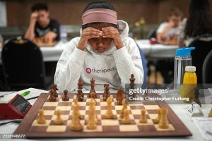 LIVERPOOL, ENGLAND - AUGUST 07: Bodhana Sivanandan, a nine-year-old chess prodigy, competes in the British Chess Championships at St. George's Hall on August 07, 2025 in Liverpool, England. The 111th British Chess Championships are taking place in Liverpool between 31 July to 10 August, with competitors vying for the title in the women's, men's, juniors' and over-60 groups. Organized by the English Chess Federation, the competition has been run annually - apart from war years - since 1904. (Photo by Christopher Furlong/Getty Images)