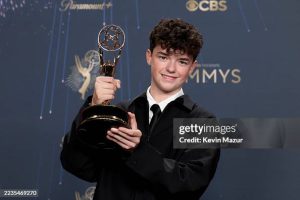 LOS ANGELES, CALIFORNIA - SEPTEMBER 14: Owen Cooper, winner of Outstanding Supporting Actor in a Limited or Anthology Series or Movie for "Adolescence," poses in the press room during the 77th Primetime Emmy Awards at Peacock Theater on September 14, 2025 in Los Angeles, California.  (Photo by Kevin Mazur/Getty Images)