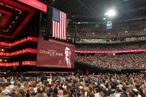 An image of Turning Point USA founder Charlie Kirk during a memorial service at State Farm Stadium in Glendale, Arizona, US, on Sunday, Sept. 21, 2025. President Donald Trump proclaimed Charlie Kirk a "martyr for American freedom" in a memorial ceremony to commemorate the political activist as Erika Kirk said she forgave the man who gunned down her husband. Photographer: Rebecca Noble/Bloomberg via Getty Images