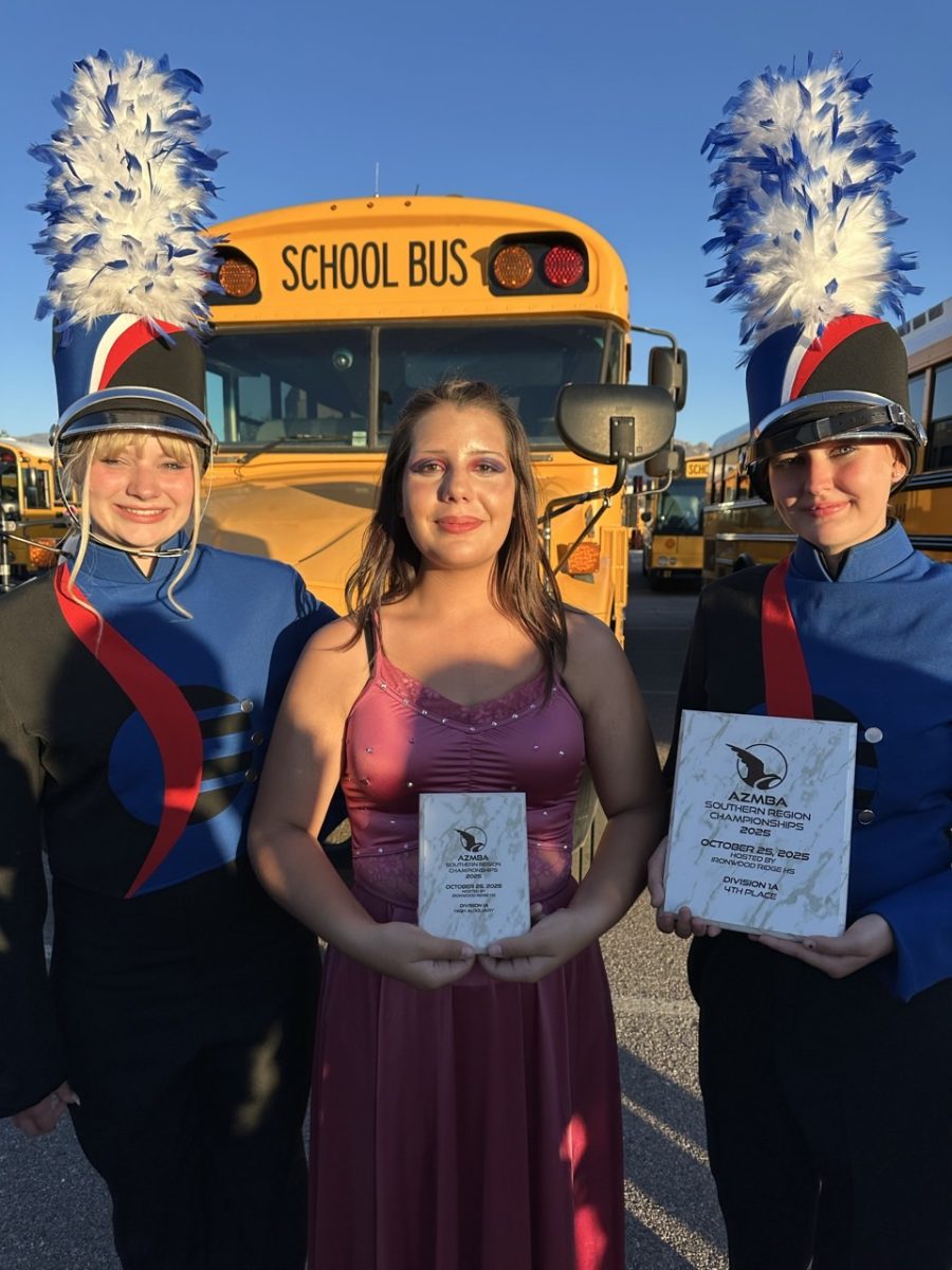 Drum Majors Light Up The Sky With Reflections of The Moon