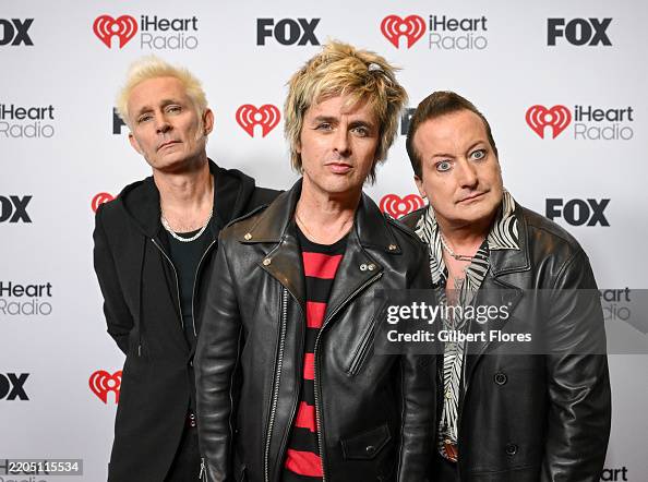 Mike Dirnt, Billie Joe Armstrong, Tré Cool of Green Day at the 2025 iHeartRadio Music Awards held at the Dolby Theatre on March 17, 2025 in Los Angeles, California. (Photo by Gilbert Flores/Billboard via Getty Images)
